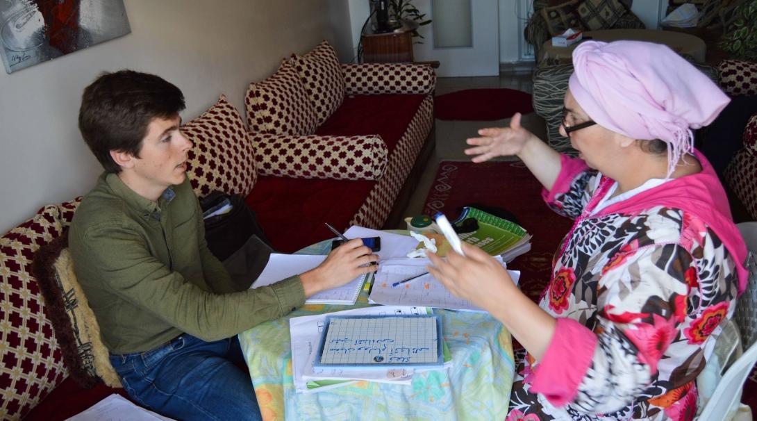 A Projects Abroad volunteer studying languages abroad has a one-on-one Arabic lesson. A volunteer learning Arabic on one of our language courses abroad.